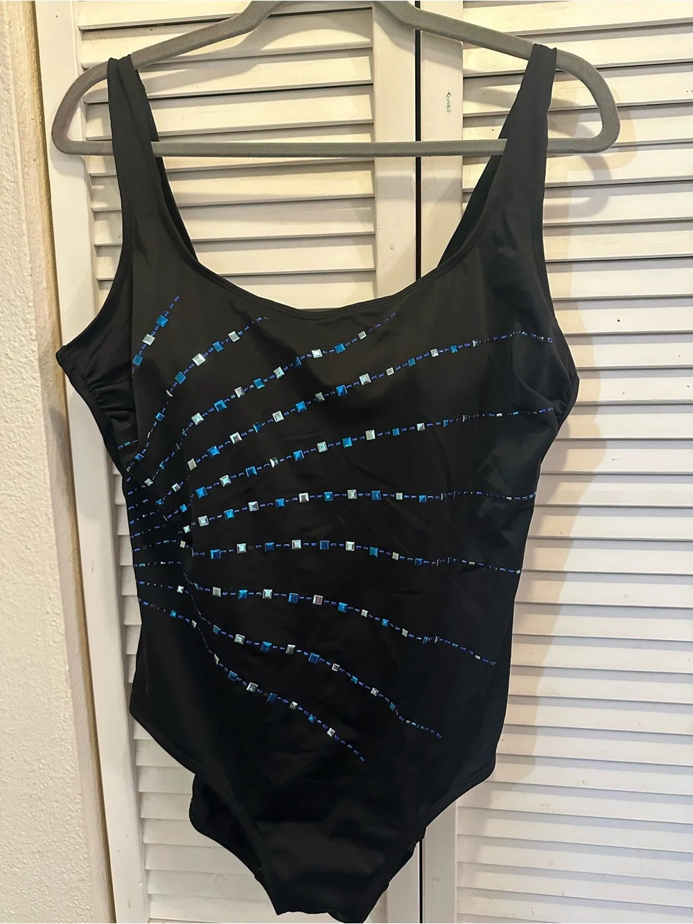 Black One-Piece Swimsuit with Blue Sequin Accent